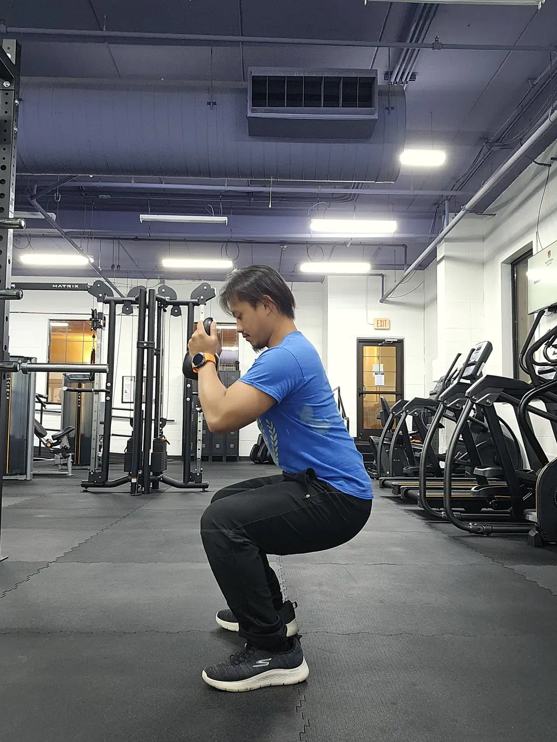 A trainer working out at The Base