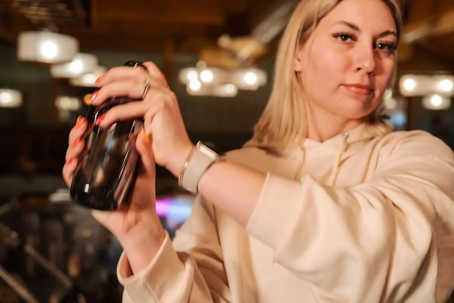 Bartender shaking a cocktail